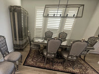 Sirius 7-piece dining set installed - ebony table with six damask chairs | Ali Guler Furniture
