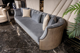 Tivoli channel-tufted grey sofa, three-quarter view