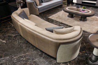 Tivoli Curved Sofa seen from behind, travertine-finish outer shell