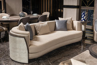 Tivoli Curved Sofa in cream with travertine-finish shell